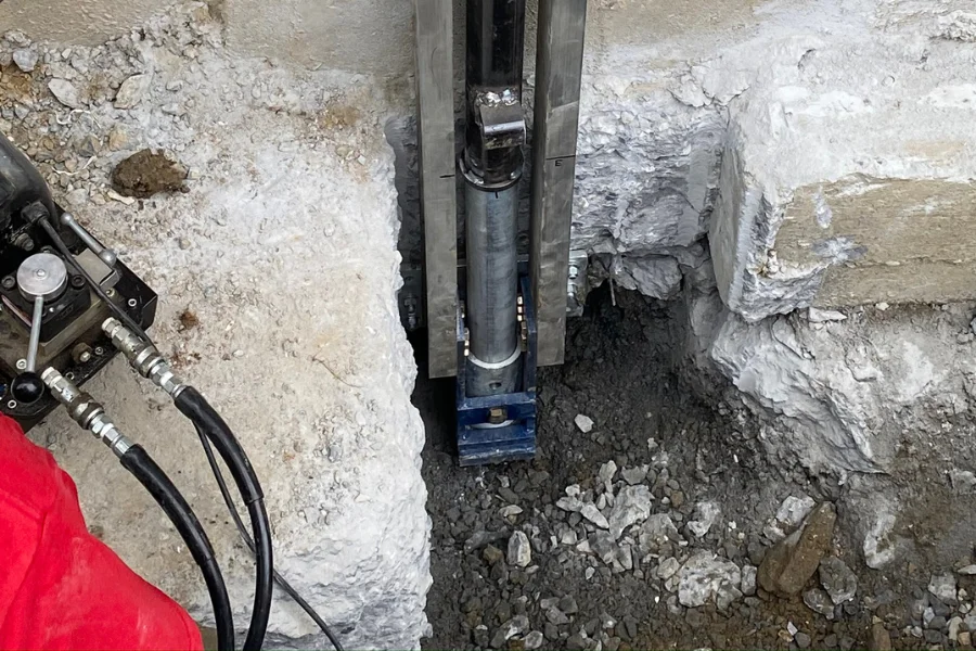 Injection pier installation process against a foundation wall in Amarillo, TX
