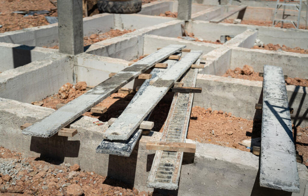 Pressed concrete pilings installation at a foundation repair site in Amarillo, TX