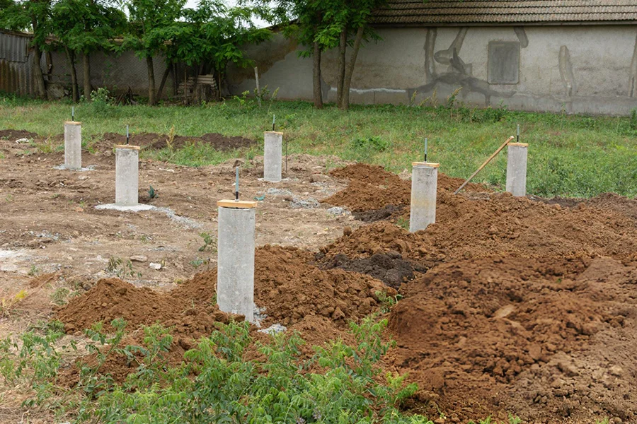 Concrete pier installation for slab foundation replacement in Amarillo, TX