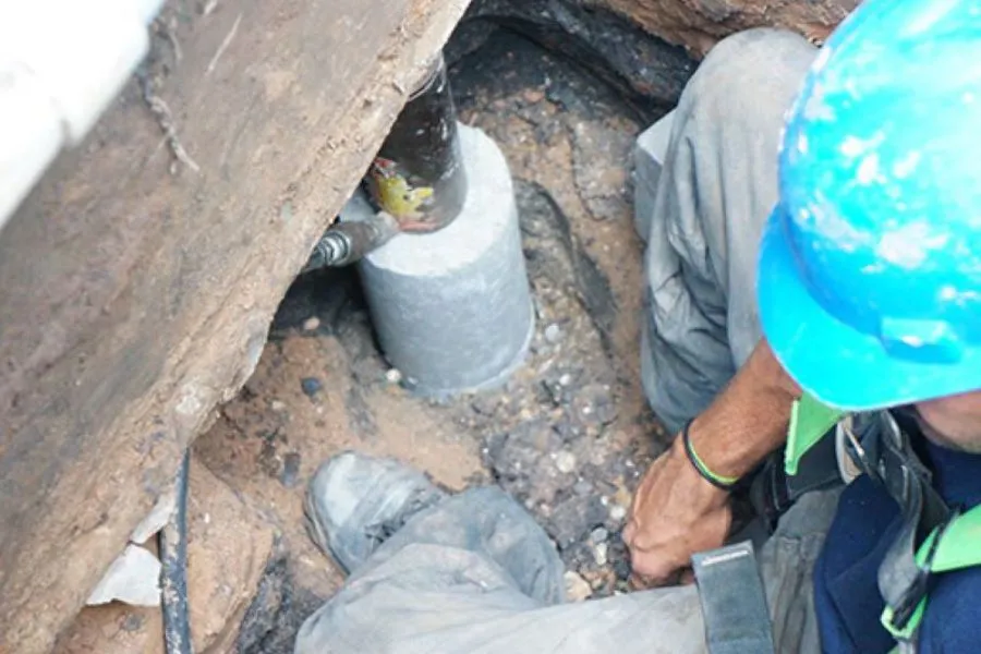Slab pier installation process under a home foundation in Amarillo, TX