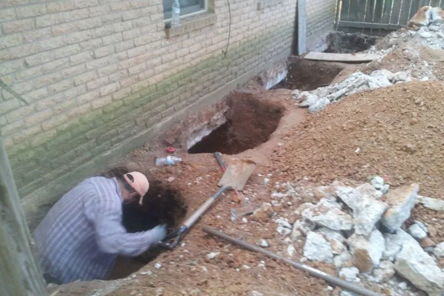 Foundation excavation for slab pier installation in Amarillo, TX